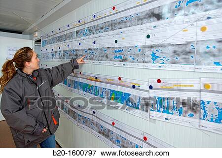 Architects supervising the planes of the skin and the sections of a tunnel, Works of the new railway platform in the Basque Country, High-speed train? Basque Y? View Large Photo Image Stock Photo - Architects supervising the planes of the skin and the sections of a tunnel, Works of the new railway platform in the Basque Country, High-speed train? Basque Y?. Fotosearch
