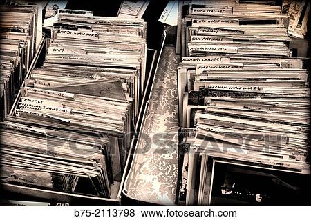 Archive of old postcards at the flea market in Spitalfields Market in London, England, UK, Europe. View Large Photo Image Stock Photo - Archive of old postcards at the flea market in Spitalfields Market in London, England, UK, Europe.. Fotosearch