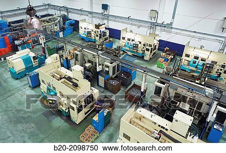Stock Image - Area automated CNC lathes. Machined Indecober. Machining of precision parts in series. Automotive industry. Berriz. Bizkaia. Basque Country. Spain.. Fotosearch