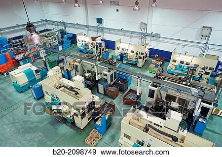 Stock Photo - Area automated CNC lathes. Machined Indecober. Machining of precision parts in series. Automotive industry. Berriz. Bizkaia. Basque Country. Spain.. Fotosearch