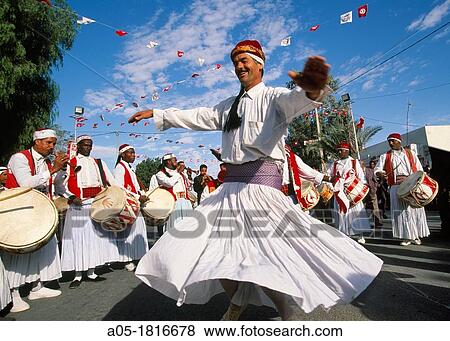 Argelian musician and dancer International Festival of the Sahara Douz Southern Tunisia. View Large Photo Image Stock Photo - Argelian musician and dancer International Festival of the Sahara Douz Southern Tunisia.. Fotosearch