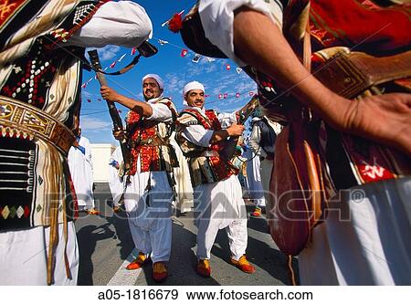 Argelian musician and dancer International Festival of the Sahara Douz Southern Tunisia. View Large Photo Image Stock Photo - Argelian musician and dancer International Festival of the Sahara Douz Southern Tunisia.. Fotosearch