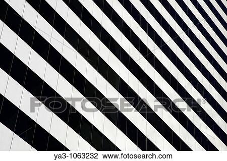 Stock Image - Argentina, Buenos Aires Province, Buenos Aires Abstract view of a skyscraper in the financial district of the microcentro of Buenos Aires. Fotosearch