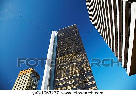 Stock Photo - Argentina, Buenos Aires Province, Buenos Aires Abstract view of skyscrapers in the financial district of the microcentro of Buenos Aires. Fotosearch
