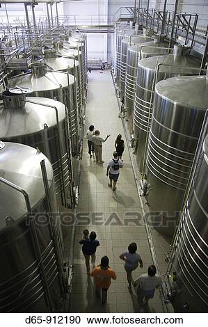 Argentina, Mendoza Province, Lujan de Cuyo, Bodega Norton winery, distillery area with visitors View Large Photo Image Stock Image - Argentina, Mendoza Province, Lujan de Cuyo, Bodega Norton winery, distillery area with visitors. Fotosearch