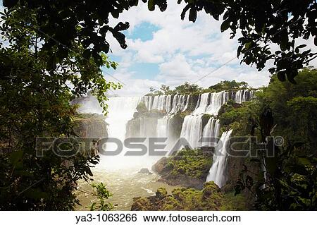 Argentina, Misiones, Iguazu National Park The impressive Iguazu waterfalls - A world heritage site View Large Photo Image Stock Photograph - Argentina, Misiones, Iguazu National Park The impressive Iguazu waterfalls - A world heritage site. Fotosearch