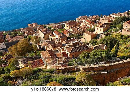 Arial view of Monemvasia Byzantine Island catsle town with acropolis on the plateau Peloponnese, Greece View Large Photo Image Stock Photo - Arial view of Monemvasia Byzantine Island catsle town with acropolis on the plateau Peloponnese, Greece. Fotosearch