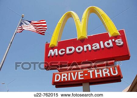 Stock Photography - Arizona USA, the McDonald's logo and the American flag. Fotosearch