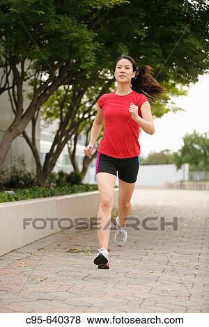 Arlington, Virginia, USA, woman jogging, 23 years old, Asian. View Large Photo Image Stock Photo - Arlington, Virginia, USA, woman jogging, 23 years old, Asian.. Fotosearch