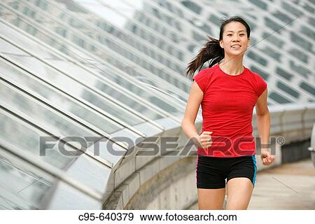 Arlington, Virginia, USA, woman jogging, 23 years old, Asian. View Large Photo Image Stock Photo - Arlington, Virginia, USA, woman jogging, 23 years old, Asian.. Fotosearch