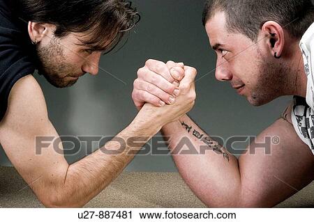 Stock Image - Arm wrestling. Fotosearch