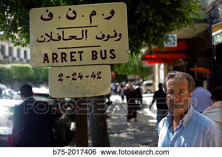 Arret Bus. Man on Bus stop in Fez, Morocco, Africa View Large Photo Image Stock Photograph - Arret Bus. Man on Bus stop in Fez, Morocco, Africa. Fotosearch