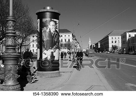 Art by Bernd Eichinger poster on a Munich advertising pillar commemorates the Resigeur View Large Photo Image Stock Image - Art by Bernd Eichinger poster on a Munich advertising pillar commemorates the Resigeur. Fotosearch