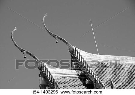 Stock Photograph - Artfull Roof of a Buddhist Temple. Fotosearch