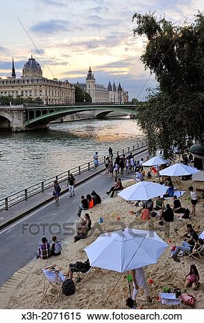 artificial beach on the Seine bank during the Paris-Plages operation, Paris, Ile de France region, France, Europe. View Large Photo Image Stock Photography - artificial beach on the Seine bank during the Paris-Plages operation, Paris, Ile de France region, France, Europe.. Fotosearch