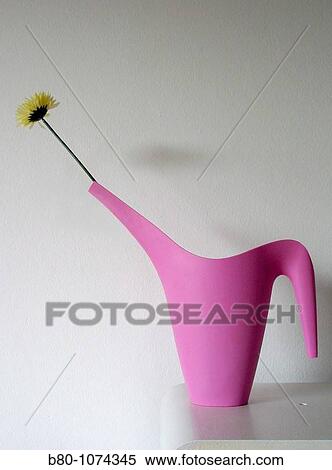 Artificial flower, man-made flower, watering can, growth, Kiel, Germany View Large Photo Image Stock Photography - Artificial flower, man-made flower, watering can, growth, Kiel, Germany. Fotosearch