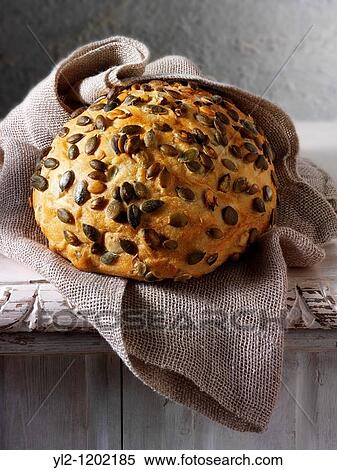 Artisan organic Pumpkin seed bread loaf View Large Photo Image Stock Photography - Artisan organic Pumpkin seed bread loaf. Fotosearch