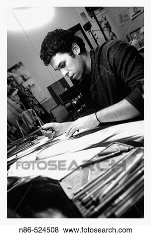 Artist at desk View Large Photo Image Stock Photo - Artist at desk. Fotosearch