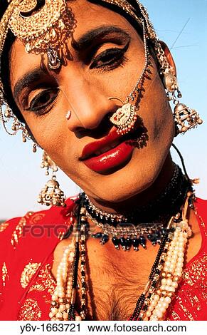 Stock Image - Artist dressed like a woman in Rajasthan, India. Fotosearch