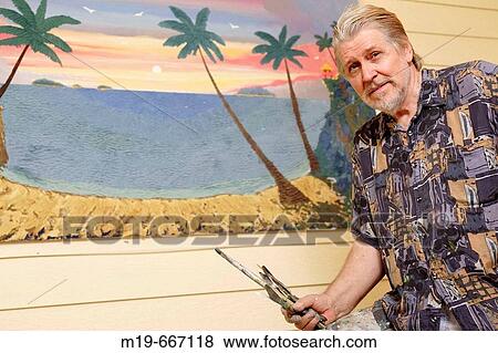 Artist with his painting View Large Photo Image Stock Photo - Artist with his painting. Fotosearch