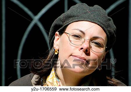 Artist woman with hat and eyeglasses View Large Photo Image Stock Photo - Artist woman with hat and eyeglasses. Fotosearch