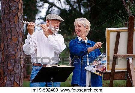 artist/musician couple ina field View Large Photo Image Stock Image - artist/musician couple ina field. Fotosearch