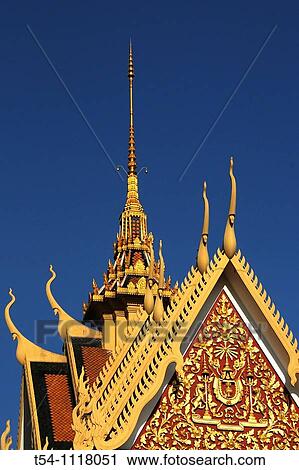 Stock Image - Artwork on the Roof of a Temple at the Silverpagoda. Fotosearch