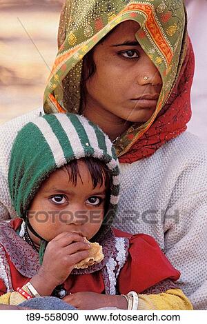 Asia, India, Alahabad, Mother and Child View Large Photo Image Stock Image - Asia, India, Alahabad, Mother and Child. Fotosearch