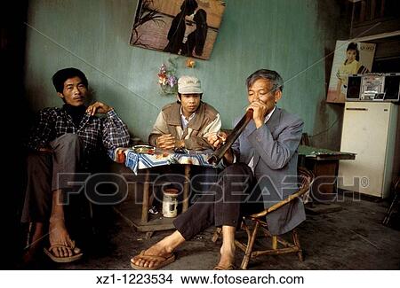Asia, North Vietnam, Hanoi, capital and second-largest city of Vietnam builded in 1010 by Minh Mang emperor, traditional restaurant with opium smoking View Large Photo Image Picture - Asia, North Vietnam, Hanoi, capital and second-largest city of Vietnam builded in 1010 by Minh Mang emperor, traditional restaurant with opium smoking. Fotosearch