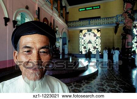 Asia, South Vietnam, Tay Ninh, Cao Dai syncretistic, monotheistic religion, Tay Ninh Holy See, disciple portrait View Large Photo Image Stock Image - Asia, South Vietnam, Tay Ninh, Cao Dai syncretistic, monotheistic religion, Tay Ninh Holy See, disciple portrait. Fotosearch
