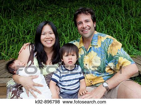 Stock Photo - Asian-American Family. Fotosearch