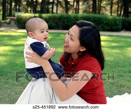 Stock Image - Asian Family at Community Park, Tustin, California. Fotosearch