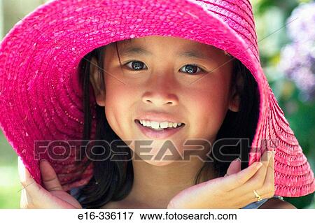 Asian girl with hat View Large Photo Image Stock Photo - Asian girl with hat. Fotosearch