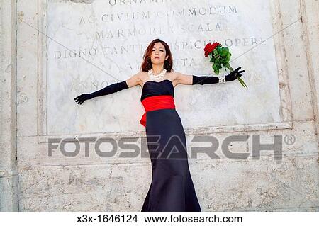 Asian girl with red roses Piazza di Spagna Rome Italy View Large Photo Image Picture - Asian girl with red roses Piazza di Spagna Rome Italy. Fotosearch