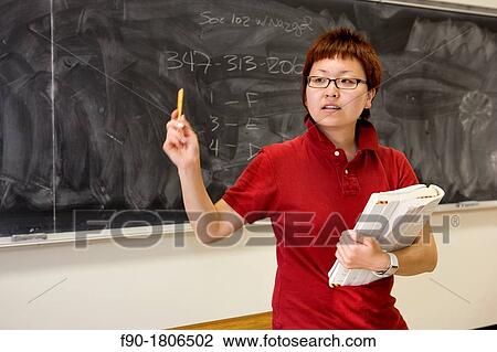 Asian graduate student in class View Large Photo Image Stock Image - Asian graduate student in class. Fotosearch