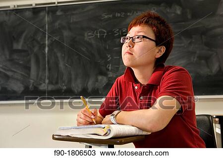 Asian graduate student in class View Large Photo Image Stock Image - Asian graduate student in class. Fotosearch