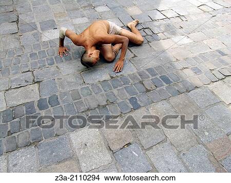 Asian Man Performing Theatre Street Act, Gent, Belgium, Europe, July 23, 2010. View Large Photo Image Picture - Asian Man Performing Theatre Street Act, Gent, Belgium, Europe, July 23, 2010.. Fotosearch