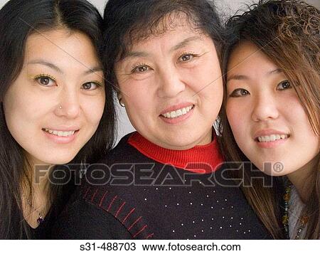 Asian Mother and daughter View Large Photo Image Stock Image - Asian Mother and daughter. Fotosearch