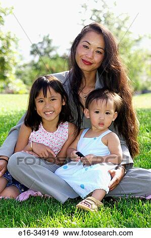 Asian mother and kids View Large Photo Image Stock Photo - Asian mother and kids. Fotosearch
