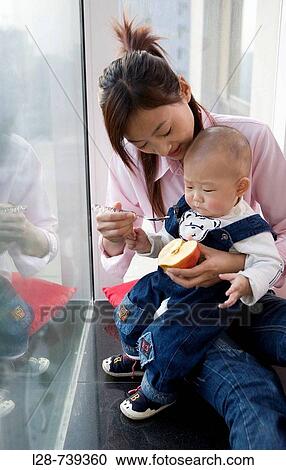 Asian mother With baby View Large Photo Image Stock Image - Asian mother With baby. Fotosearch