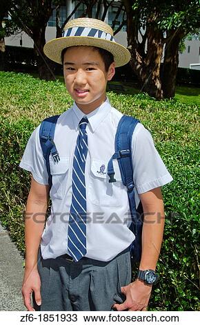 Asian school boy aged 13 in uniform in Sydney Australia in New South Wales View Large Photo Image Stock Image - Asian school boy aged 13 in uniform in Sydney Australia in New South Wales. Fotosearch