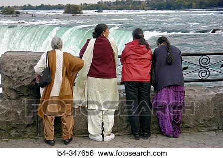 Asian visitors to Niagara Falls View Large Photo Image Stock Photograph - Asian visitors to Niagara Falls. Fotosearch
