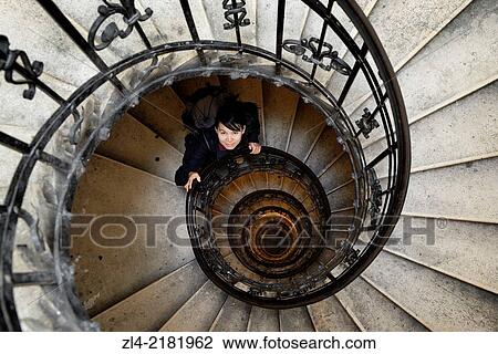 Asian woman in the spiral (helical) staircase in the tower of the Basilica of St Stephen. Hungary, Budapest, Pest, Belvaros. Model Released. View Large Photo Image Stock Image - Asian woman in the spiral (helical) staircase in the tower of the Basilica of St Stephen. Hungary, Budapest, Pest, Belvaros. Model Released.. Fotosearch