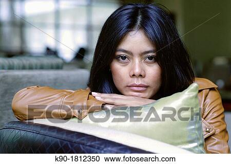 Stock Image - Asian woman, Indonesia, Southeast Asia. Fotosearch