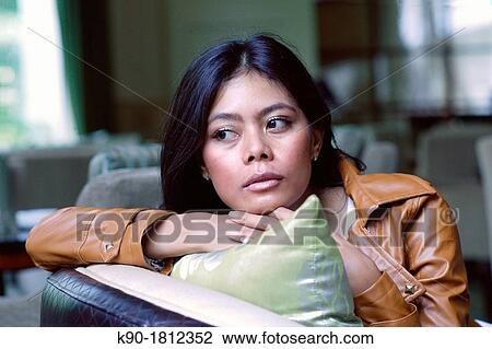Stock Image - Asian woman, Indonesia, Southeast Asia. Fotosearch
