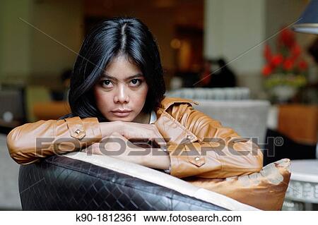 Stock Image - Asian woman, Indonesia, Southeast Asia. Fotosearch