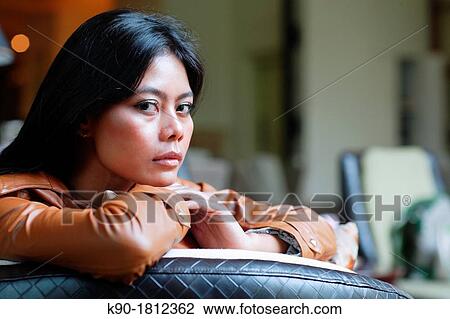 Stock Image - Asian woman, Indonesia, Southeast Asia. Fotosearch