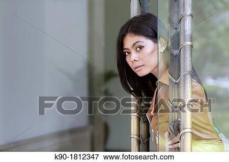 Stock Photo - Asian woman, Indonesia, Southeast Asia. Fotosearch
