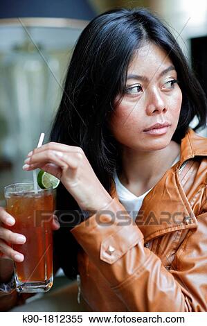 Stock Photography - Asian woman, Indonesia, Southeast Asia. Fotosearch
