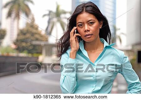 Stock Photography - Asian woman, Indonesia, Southeast Asia. Fotosearch